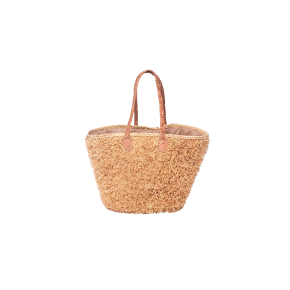 Beige, handgefertigte Basttasche aus Rafia mit shaggy Oberfläche und geflochtenen Lederhenkeln