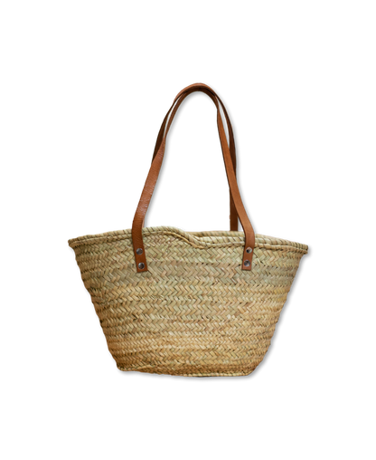 Handgewebte Strohtasche aus Naturstroh mit zwei schmalen, braunen Lederhenkeln